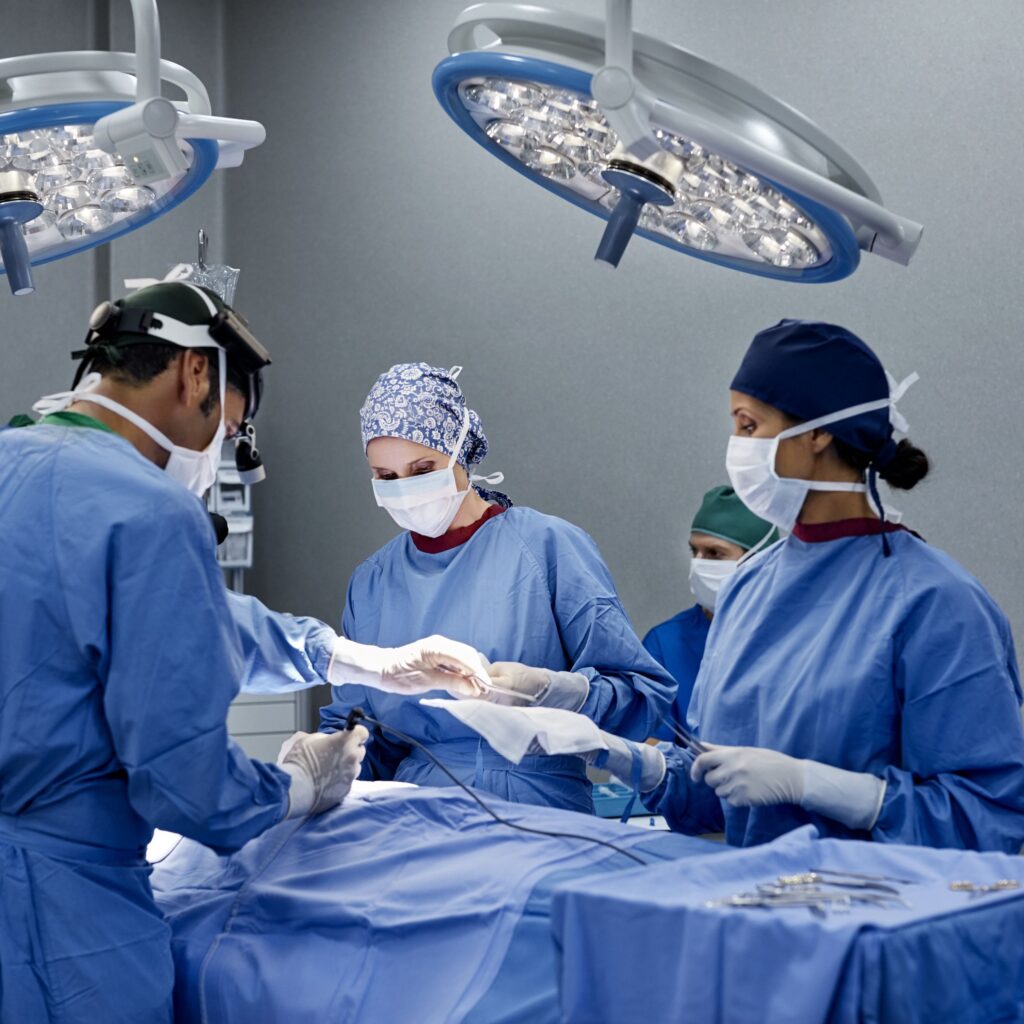 surgeon operating patient on table at hospital 695465248 594d78063df78cae8102d5bd